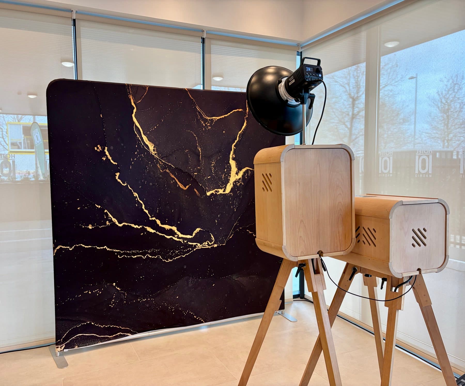 Vintage photo booth with a custom backdrop at Hotel101 Madrid